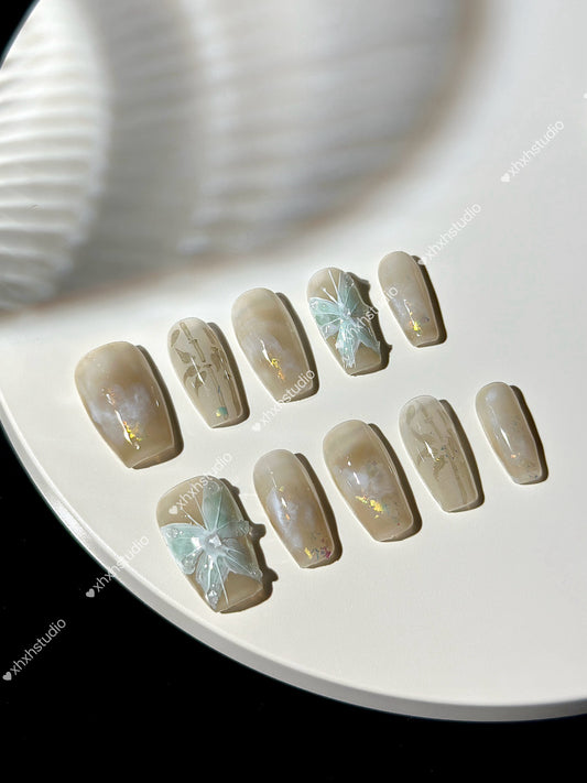 Luminous Butterfly Charm Nail Art
